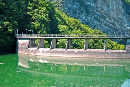artificial dam in mountain lake for power generationの写真素材