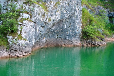 mountain lake of fresh water produced for the production of electricityの写真素材