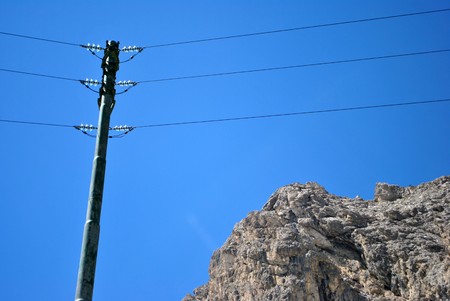 ski lifts in the rocky mountains of the Dolomitesの写真素材