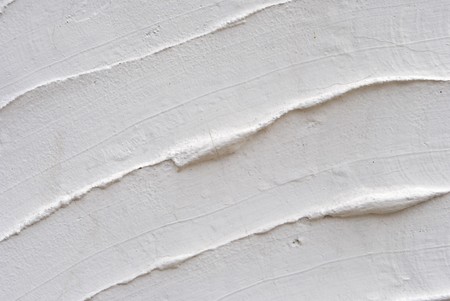 texture with white cement and plaster bas relief lines and spatulaの写真素材