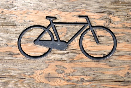 indicating road bike dug in the woodの写真素材