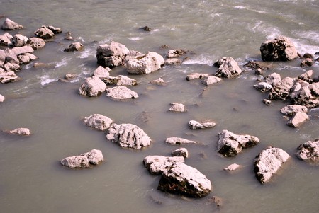 water with rocks protrudingの写真素材