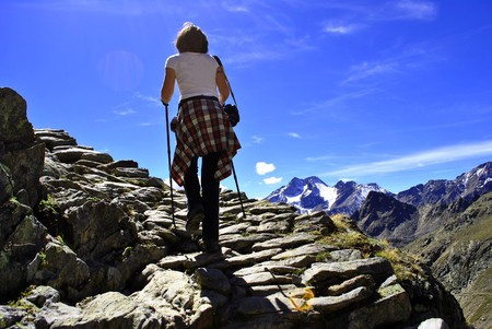 girl rock trail in the mountains at high altitudesの写真素材