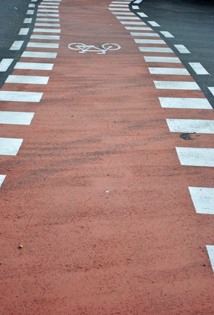 road bike with red floor to alert transit bicyclesの写真素材