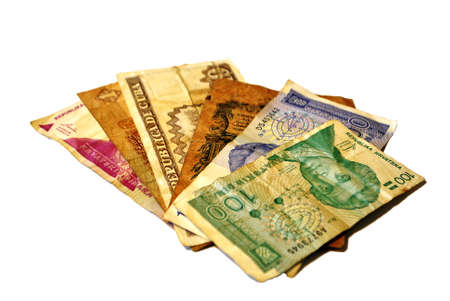paper money and coins on white background