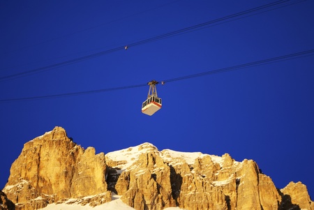 cable car in the winter to transport skiers in the Italian Alpsの写真素材