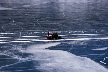 Alpine Lake with snow, ice and water の写真素材