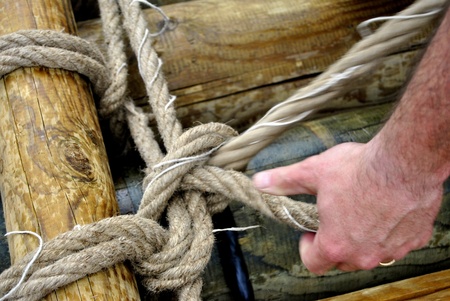 hands and hemp rope