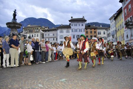 TRENTO - JUNE 24: Historical pageants with period costumes to celebrate Trento's patron saint, San Vigilio June 24,2011 In Trento, Italy. The celebration for the Saint Patron of the town, Saint Vigiliusのeditorial素材