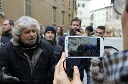 ROVERETO, ITALY - DEC 16: The showman and political figure, Beppe Grillo, presents the candidates at the elections of his political movement called "Movimento Cinque Stelle" Dec 16, 2012 in Rovereto, Italy. のeditorial素材