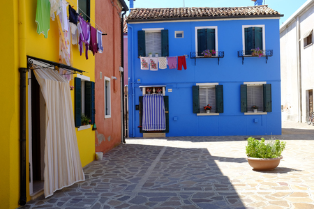 Venice, Italy, August 6, 2014. Tourists walk along the streets of the island of Burano in the Venetian lagoon.のeditorial素材