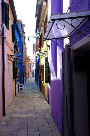 BURANO, ITALY - August 6: Canal with colorful houses on the famous island Burano, Venice on September 1, 2007 in Burano. Venice and the Venetian lagoon are on the UNESCO World Heritage Listのeditorial素材