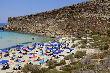 LAMPEDUSA, ITALY - JULY 05: Some boats near the beach Spiaggia dei Conigli, the most beautiful beach in the world according Travelers Choice Awards list, on July 05, 2015, in Lampedusa, Italyのeditorial素材