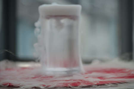 carbon dioxide is heavier than air visible on the glassの写真素材