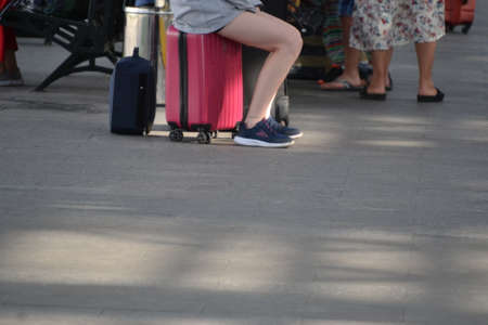 Travelers at the Ukrainian capital Kiev waiting at the railway station for the next trainの写真素材