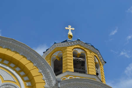 yellow church dome with bell tower in kyivの写真素材