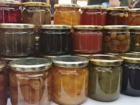 Preserves in small jars filled and sealed
