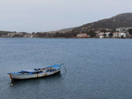 a fishing boat painted in blue and whiteの写真素材