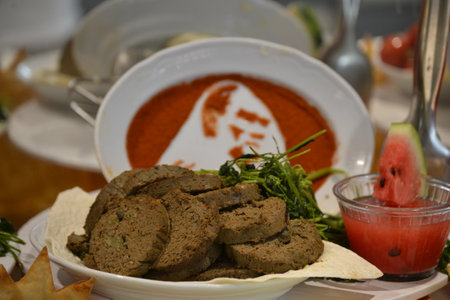 pÃ¢tÃ© prepared on a plate with decoration around it