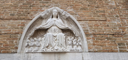a statue of a saint in Venice the saint protects her citizensの写真素材