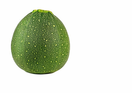 One Round Courgettes isolated on a white backgroundの写真素材