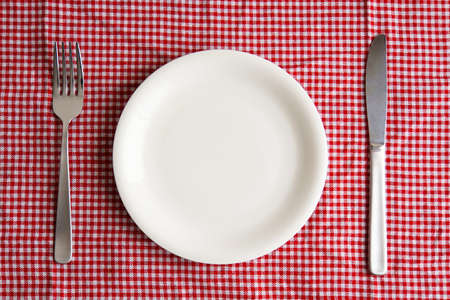 White plate on the table. Image of meal.の写真素材