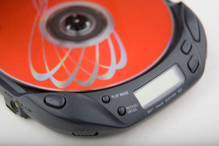 portable cd player with red diskの写真素材