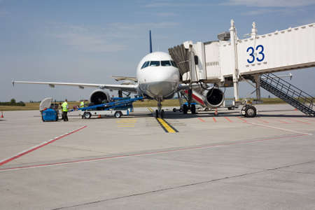aircraft on the ground, getting loaded