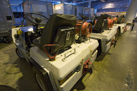 parking gas powered cargo cars in the airportの写真素材