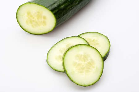 sliced cucumber, isolated on whiteの写真素材