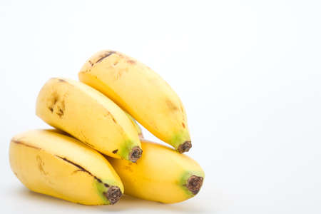 banana bundle isolated on white backgroundの写真素材