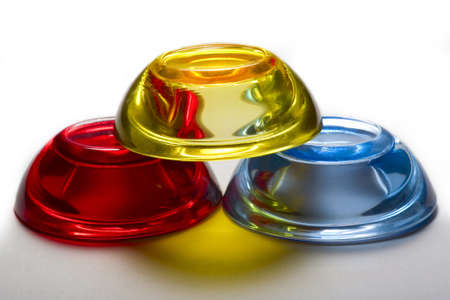 three colorful tea light candle holderの写真素材