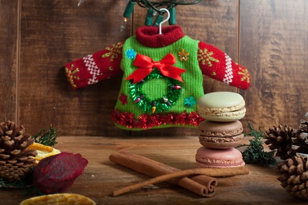Christmas background with macaroons on wood backgroundの写真素材