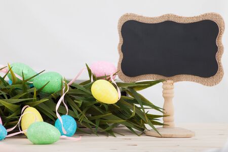 Colored easter eggs background with banner for yor text