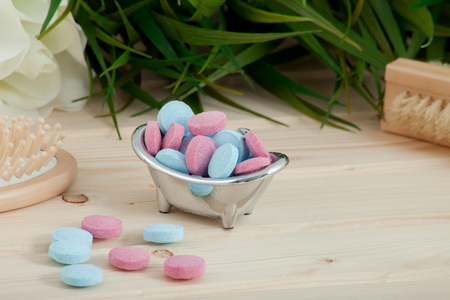 Bath Time color tablets for kids on wood backgroundの写真素材