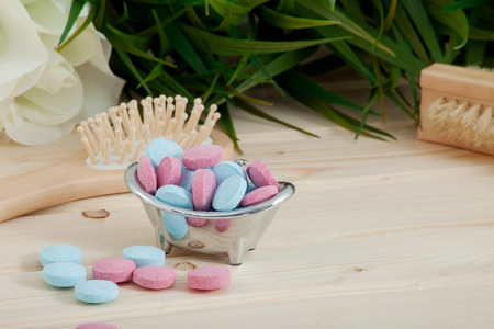 Bath Time color tablets for kids on wood backgroundの写真素材