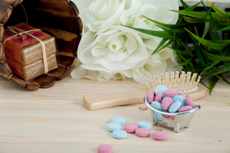 Bath Time color tablets for kids on wood backgroundの写真素材