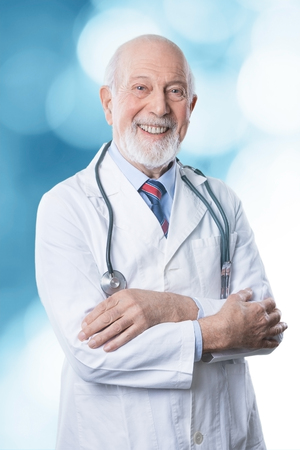 Portrait of friendly male doctorの写真素材