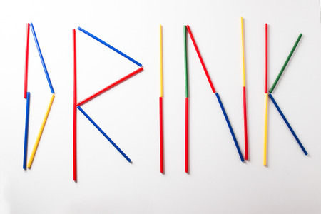 Multi Color flexible straws isolated on background.の写真素材