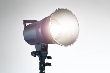 beautiful professional  studio flash isolated on white,hard light .