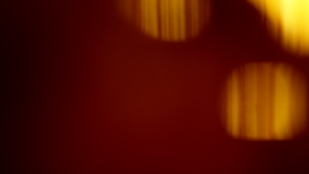 Designed film texture background with heavy grain, dust and a light leakの写真素材