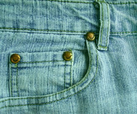 Background a jeans pocket with metal buttonsの写真素材