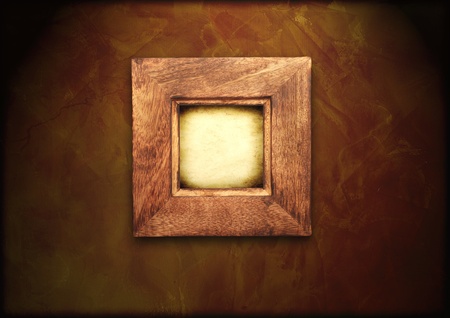 Retro wooden frames on stucco wallの写真素材