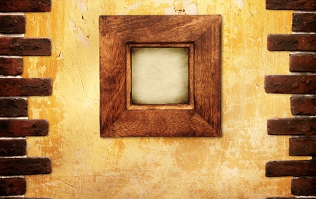 Retro wooden frame on stucco wallの写真素材