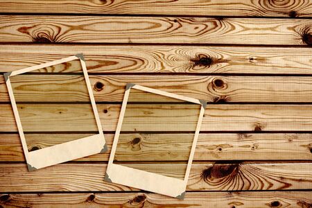 Old photos on wooden boardの写真素材