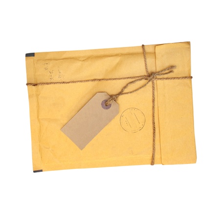 Old envelope with label for scrapbooking design. Isolated over white