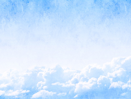 Grunge background with clouds and paper textureの写真素材