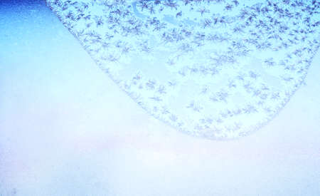 Beautiful frosty pattern on windowの写真素材