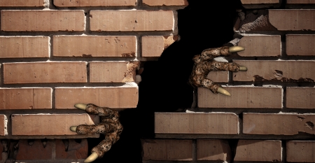 Dark series - paws of monster , breaking a brick wallの写真素材