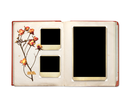 Old book and photos. Objects isolated on white の写真素材